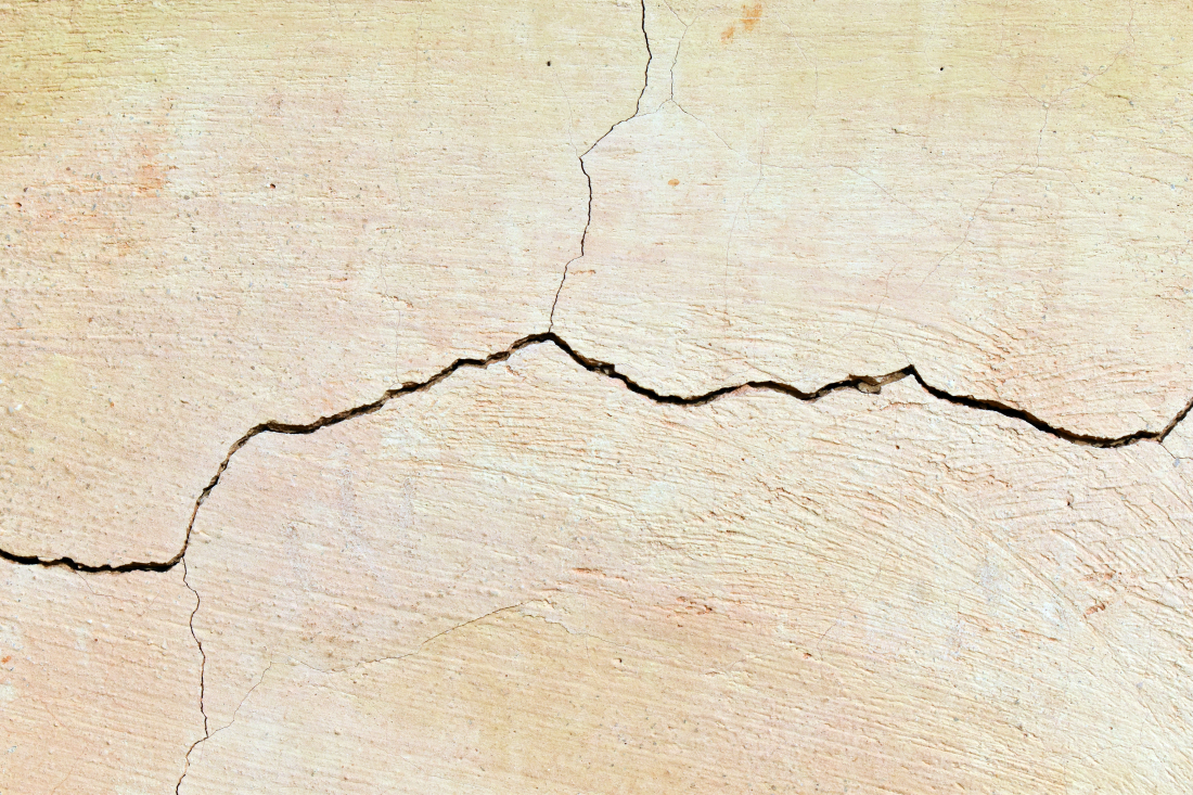 fissure enduit pierre